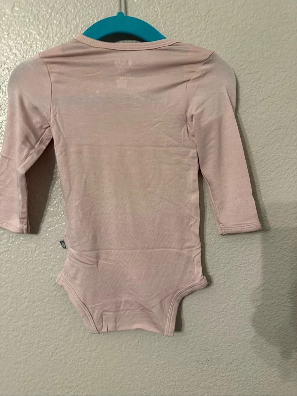 Kyte BABY Long-Sleeve One-Piece Bodysuit in Pale Pink